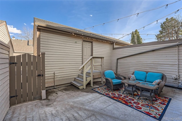 view of patio featuring entry steps, a gate, outdoor lounge area, and fence