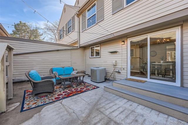 view of patio with outdoor lounge area and central air condition unit