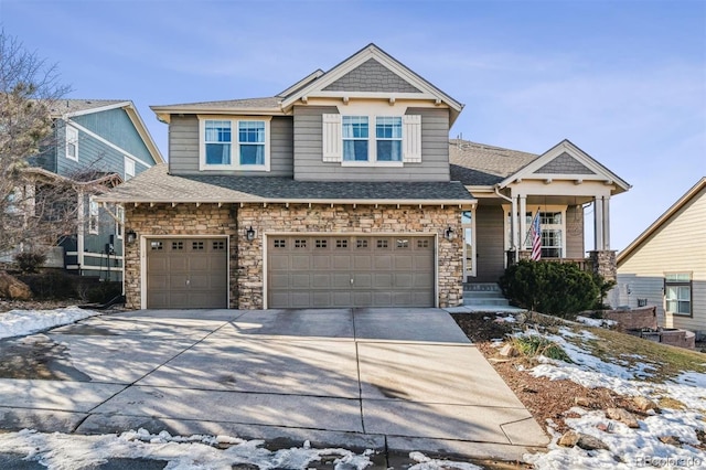 craftsman inspired home with a garage