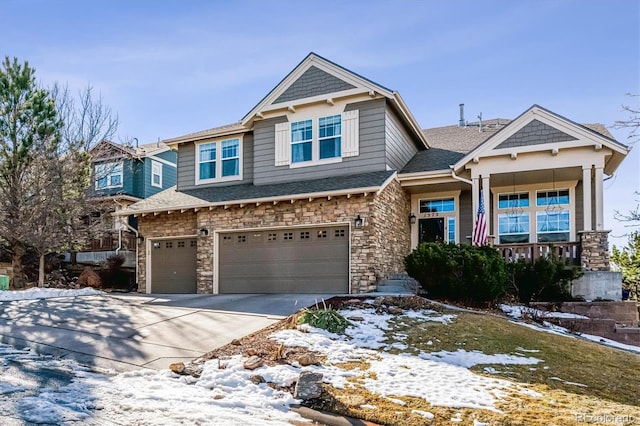 craftsman-style home with a garage