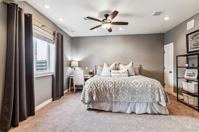 carpeted bedroom featuring ceiling fan