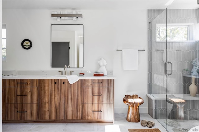 bathroom featuring vanity, tile patterned floors, and an enclosed shower