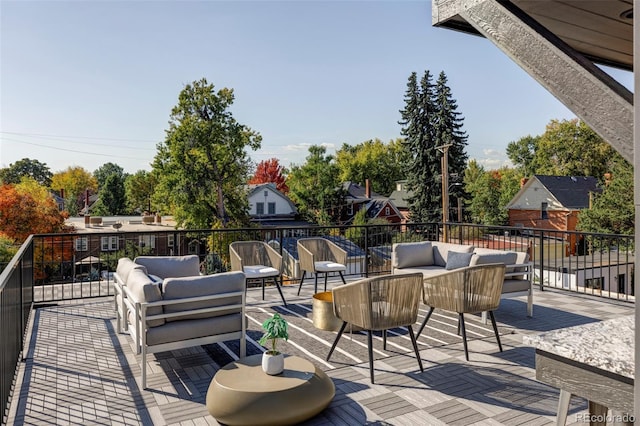 wooden deck featuring an outdoor living space