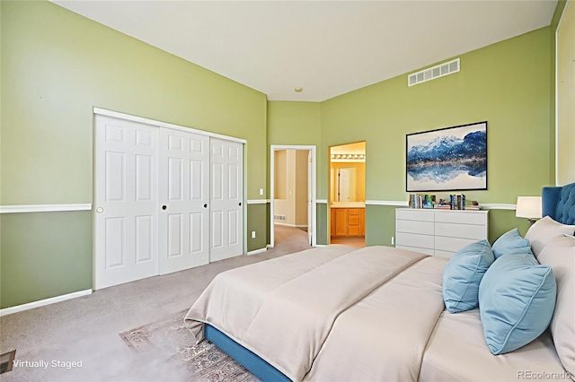 10231 Spotted Owl Ave, Highlands Ranch, CO 80129 - bedroom featuring light carpet, a closet, and ensuite bathroom