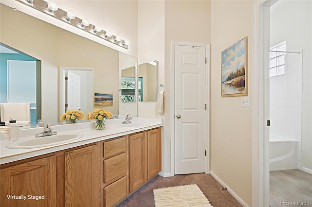 10231 Spotted Owl Ave, Highlands Ranch, CO 80129 - full bath featuring double vanity and baseboards