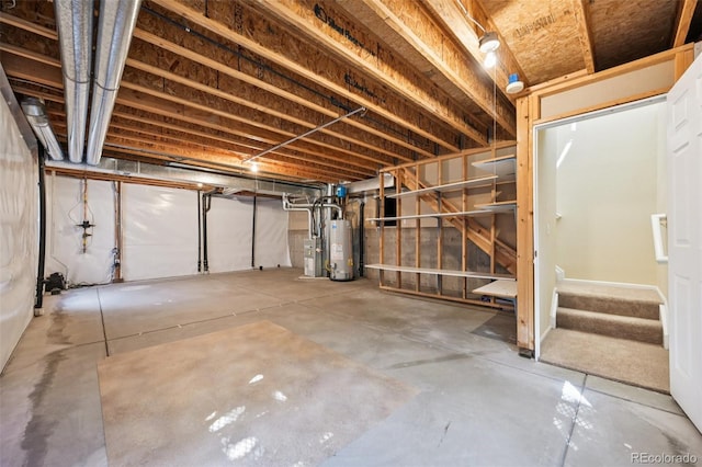 10231 Spotted Owl Ave, Highlands Ranch, CO 80129 - unfinished basement with gas water heater and stairs