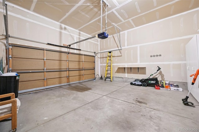 10231 Spotted Owl Ave, Highlands Ranch, CO 80129 - garage featuring a garage door opener