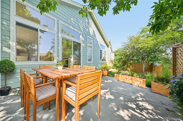 10231 Spotted Owl Ave, Highlands Ranch, CO 80129 - view of patio featuring outdoor dining space