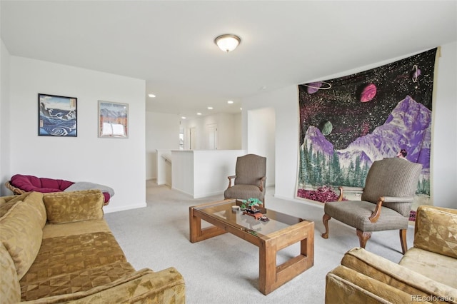 living room featuring recessed lighting, baseboards, and carpet