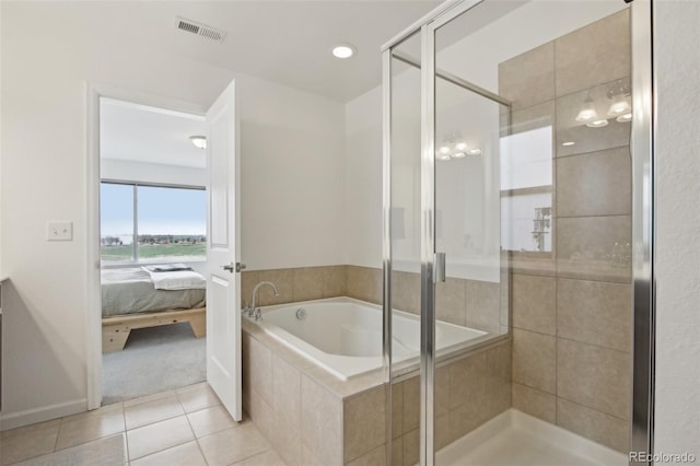 ensuite bathroom with a bath, visible vents, a shower stall, tile patterned floors, and ensuite bathroom