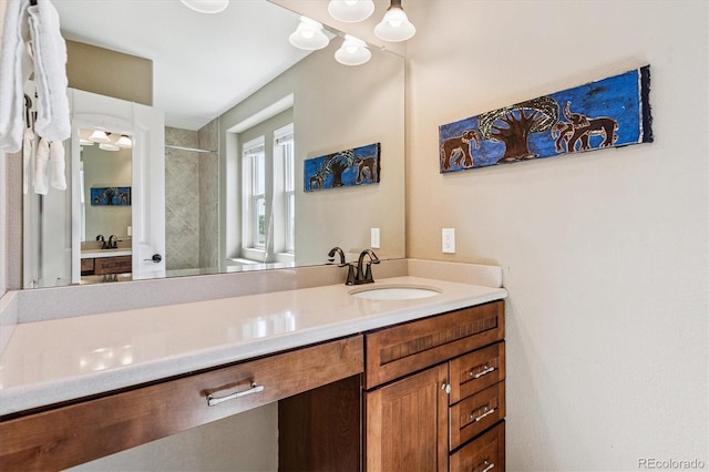 8695 E 49th Pl, Denver, CO 80238 - full bathroom featuring tiled shower and vanity