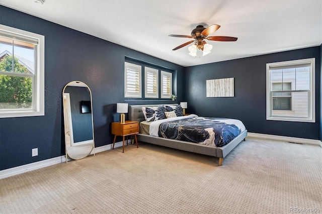 8695 E 49th Pl, Denver, CO 80238 - bedroom featuring carpet floors and a ceiling fan