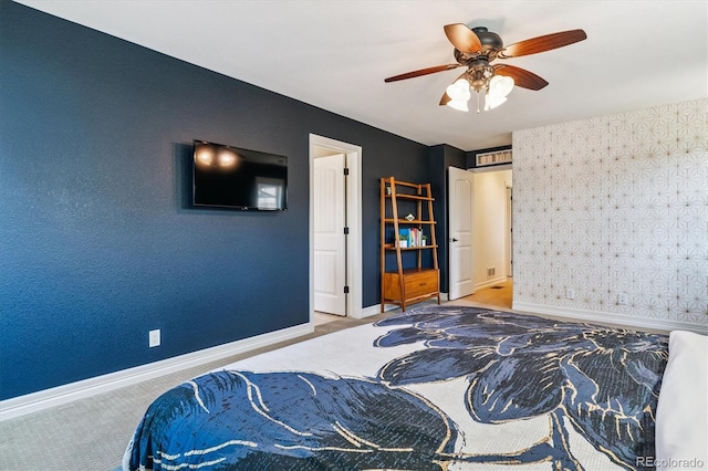 8695 E 49th Pl, Denver, CO 80238 - carpeted bedroom with ceiling fan and an accent wall