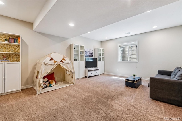 8695 E 49th Pl, Denver, CO 80238 - recreation room with carpet and recessed lighting