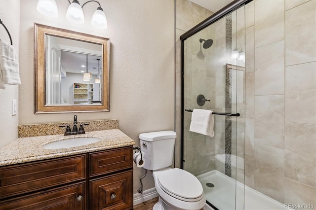 8695 E 49th Pl, Denver, CO 80238 - full bathroom featuring a shower stall and vanity