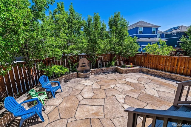 8695 E 49th Pl, Denver, CO 80238 - fenced backyard featuring a patio area