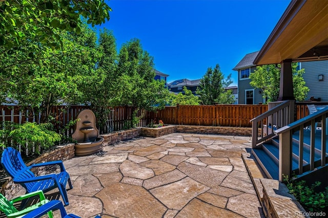 8695 E 49th Pl, Denver, CO 80238 - fenced backyard featuring a patio