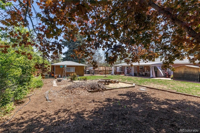 12375 W 19th Pl, Lakewood, CO 80215 - view of yard featuring an outbuilding