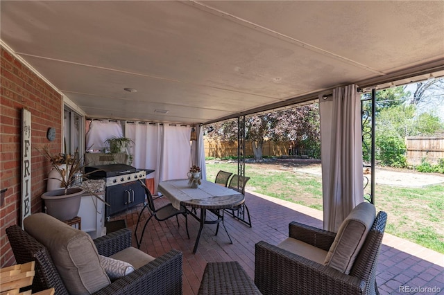 12375 W 19th Pl, Lakewood, CO 80215 - view of patio featuring fence and outdoor lounge area