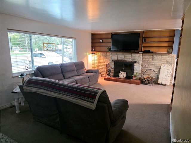 12375 W 19th Pl, Lakewood, CO 80215 - carpeted living area with a fireplace and baseboards