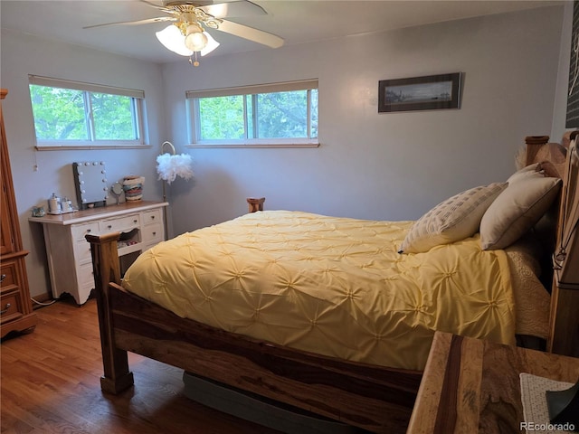 12375 W 19th Pl, Lakewood, CO 80215 - bedroom with wood finished floors and a ceiling fan