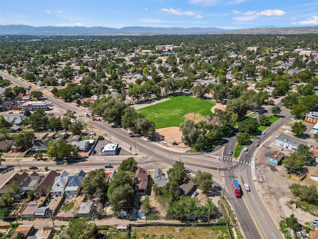 birds eye view of property featuring a mountain view