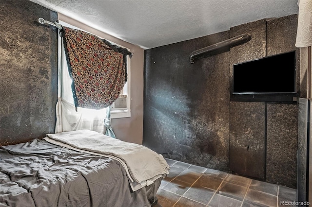 bedroom featuring a textured ceiling