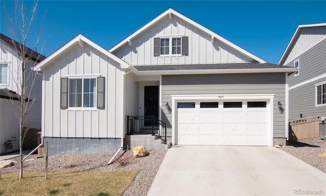 view of front of house with driveway and board and batten siding