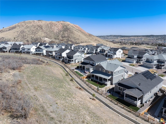 drone / aerial view with a mountain view and a residential view