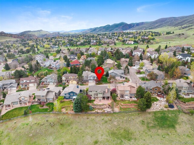 aerial view with a residential view and a mountain view