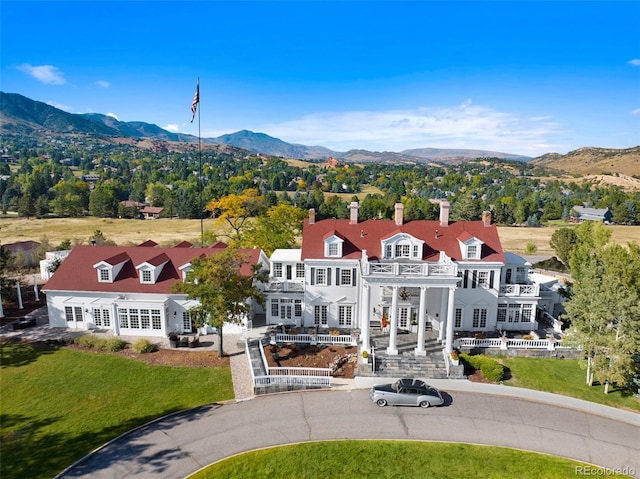 9 Amaranth Dr, Littleton, CO 80127 - aerial view featuring a mountain view