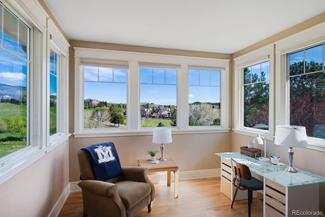 9 Amaranth Dr, Littleton, CO 80127 - sunroom with baseboards and wood finished floors