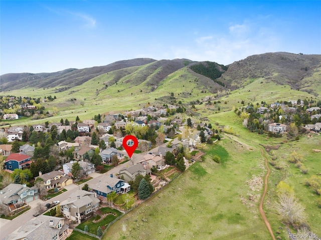 9 Amaranth Dr, Littleton, CO 80127 - aerial view of property and surrounding area with nearby suburban area and a mountain backdrop