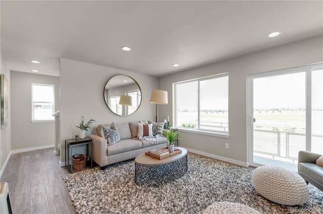 46534 Avery Ln, Bennett, CO 80102 - living room with recessed lighting, baseboards, and wood finished floors