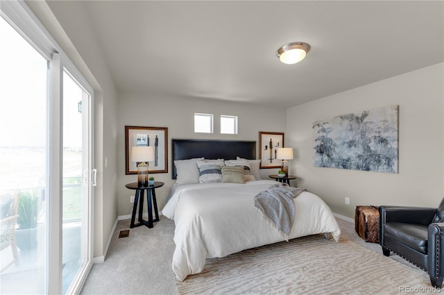 46534 Avery Ln, Bennett, CO 80102 - bedroom featuring light carpet, baseboards, and access to outside