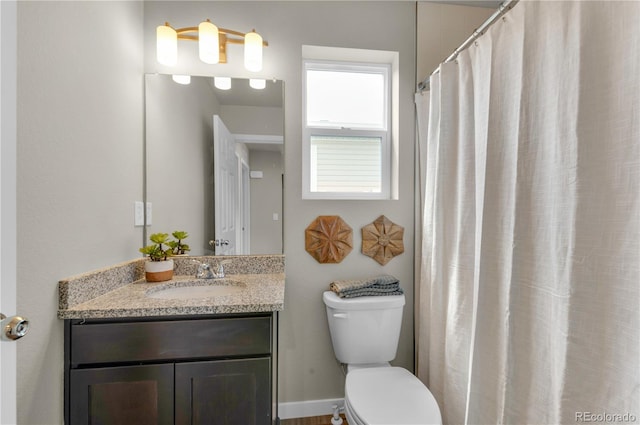 46534 Avery Ln, Bennett, CO 80102 - full bath with vanity, toilet, and a shower with curtain