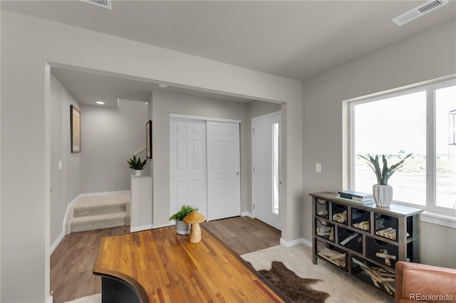 46534 Avery Ln, Bennett, CO 80102 - foyer featuring wood finished floors, baseboards, and recessed lighting