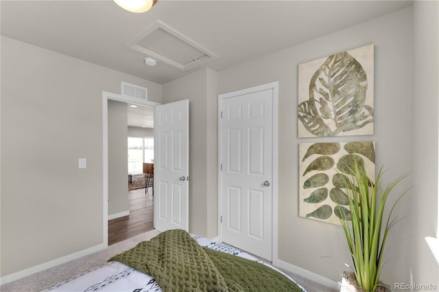 46534 Avery Ln, Bennett, CO 80102 - bedroom featuring baseboards, attic access, and carpet