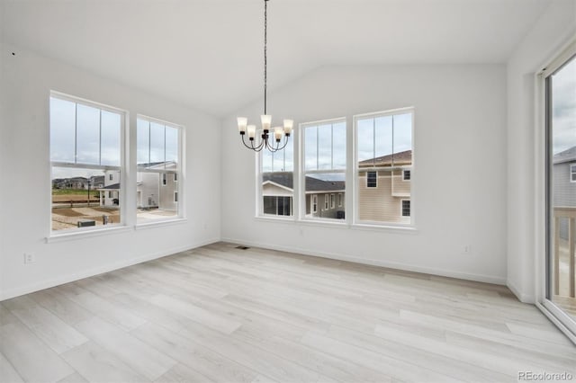 24768 E 40th Ave, Aurora, CO 80019 - unfurnished sunroom with a chandelier, plenty of natural light, and lofted ceiling