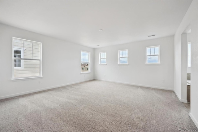 24768 E 40th Ave, Aurora, CO 80019 - empty room featuring light carpet and baseboards
