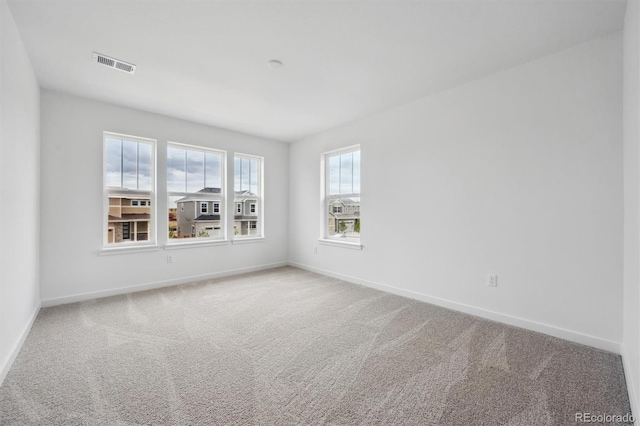 24768 E 40th Ave, Aurora, CO 80019 - spare room featuring carpet and baseboards
