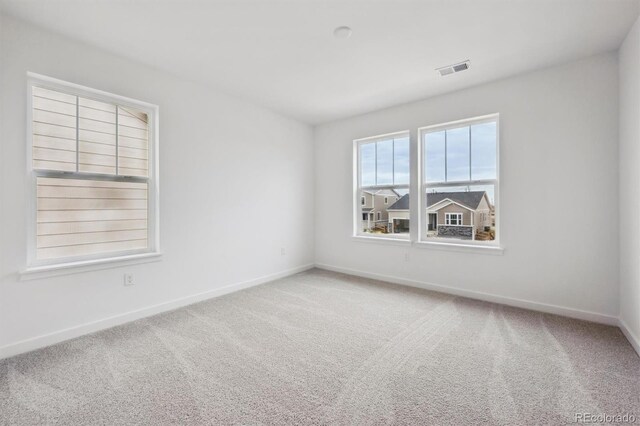 24768 E 40th Ave, Aurora, CO 80019 - unfurnished room featuring baseboards and carpet