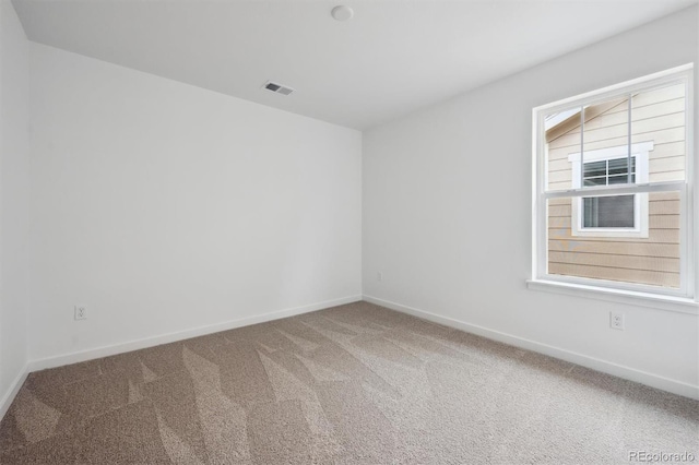 24768 E 40th Ave, Aurora, CO 80019 - carpeted empty room featuring baseboards