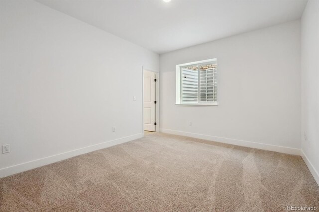 24768 E 40th Ave, Aurora, CO 80019 - empty room with light colored carpet and baseboards