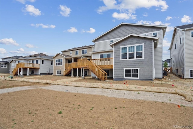 24768 E 40th Ave, Aurora, CO 80019 - rear view of house featuring stairway, a deck, and a residential view