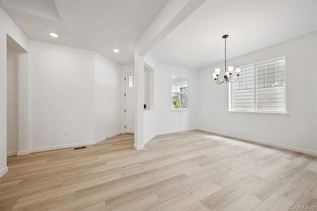24768 E 40th Ave, Aurora, CO 80019 - empty room with baseboards, a chandelier, recessed lighting, and light wood-style floors