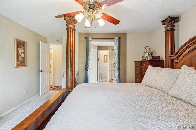 bedroom with carpet flooring, baseboards, ceiling fan, ensuite bath, and a textured ceiling