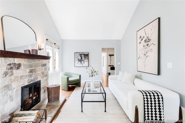 315 S Franklin St, Denver, CO 80209 - living room featuring a fireplace and high vaulted ceiling