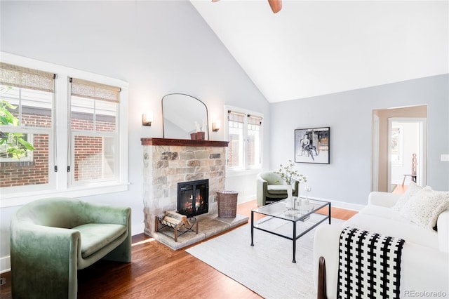 315 S Franklin St, Denver, CO 80209 - living room with wood finished floors, high vaulted ceiling, a fireplace, ceiling fan, and baseboards