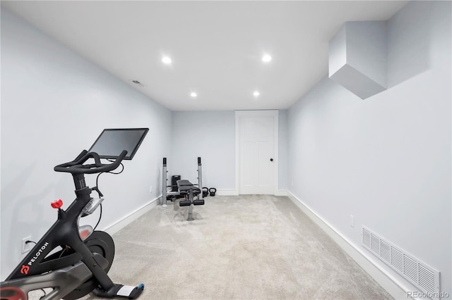 workout area with light carpet